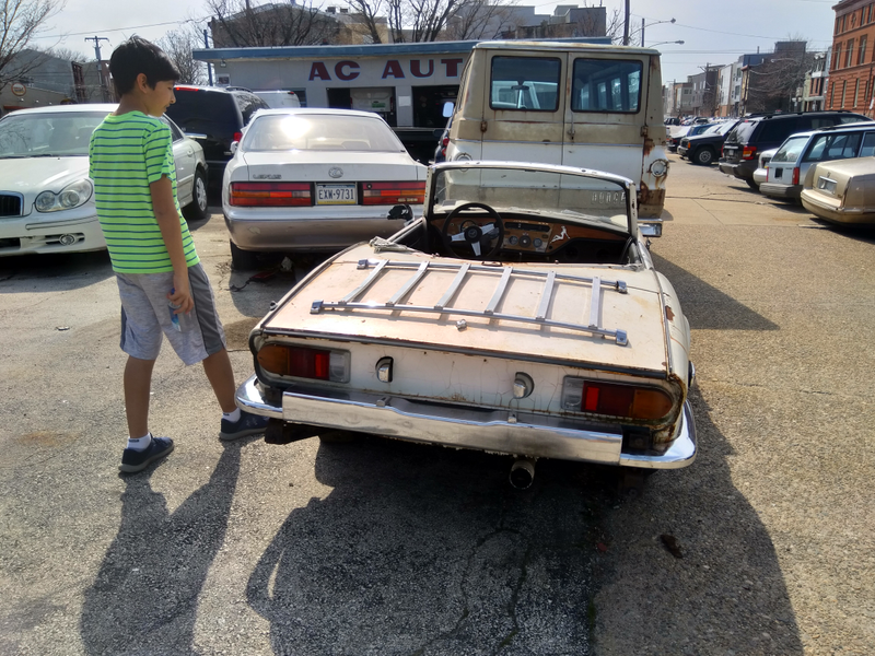 11-year-old kid for scale. It’s a very tiny car.